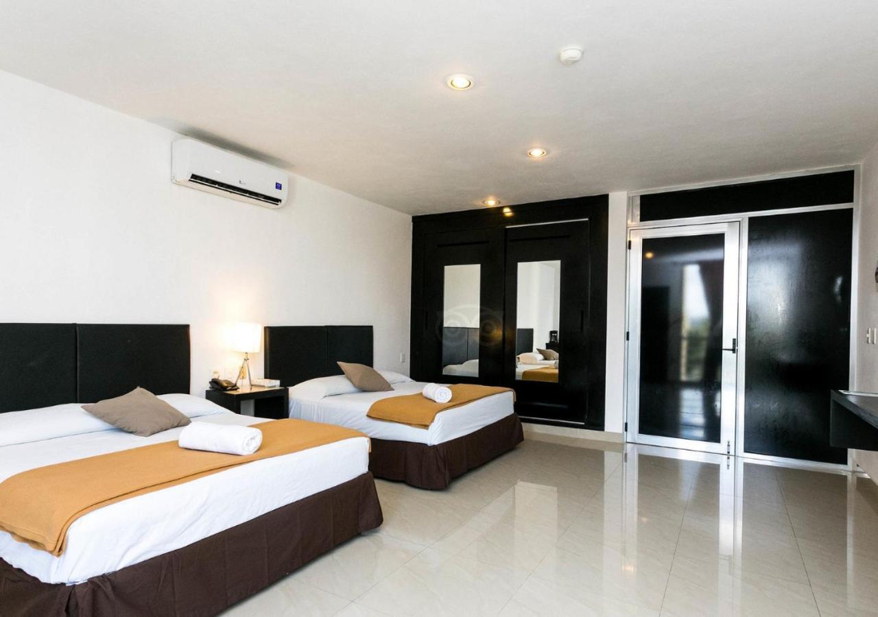 Sunrise 42 Suites By Holiday In Playa بلايا ديل كارمن المظهر الخارجي الصورة